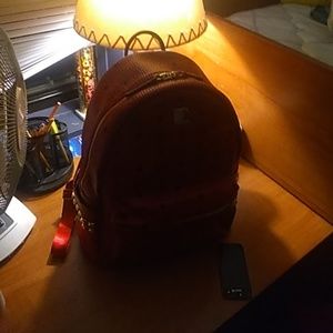 Red mcm backpack